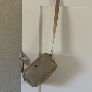Lululemon crossbody camera bag. Check it out on line. Used 3 x for travel.